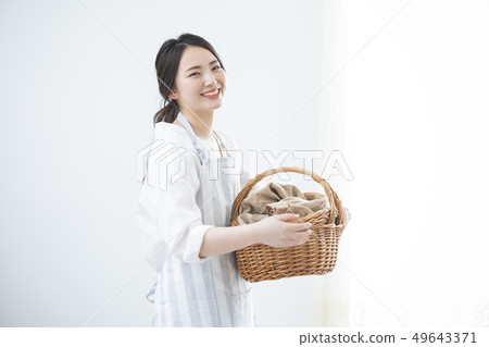 Woman with ax 49643371