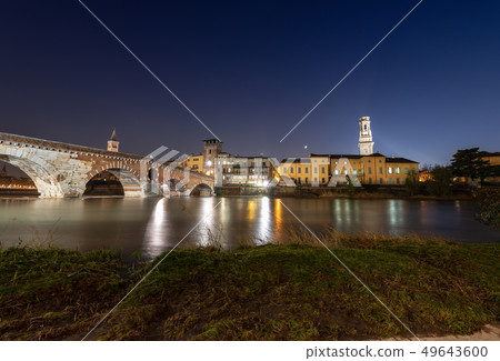 Ponte Pietra and Adige River at night - Verona 49643600