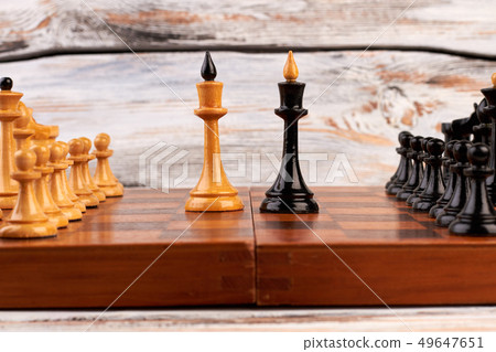 Composition of the chess pieces on a chess board. Composition of the chess pieces on a chess board. 49647651