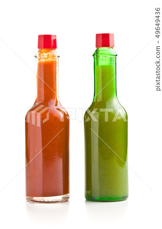Tabasco hot sauce bottle. Red and green sauce. Tabasco hot sauce bottle. Red and green sauce. 49649436