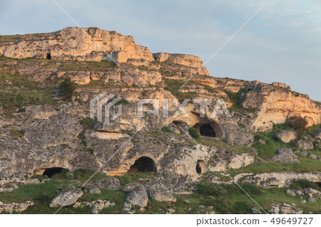 Caves on the side of the Gravina Canyon. Matera, 49649727
