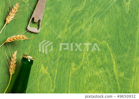 Bright background with beer bottle 49650932