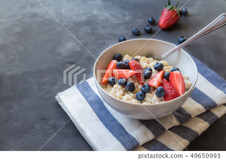 Oatmeal with blueberries and strawberries for 49650993