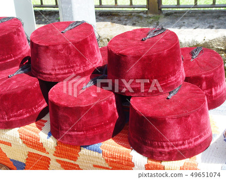 Turkish fez for sale on the local market. Turkey Turkish fez for sale on the local market. Turkey 49651074