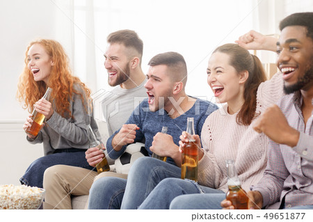 Football fans. Friends watching soccer on tv 49651877