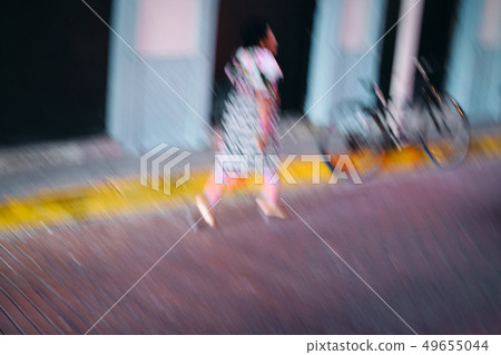 Guna Yala Woman with Traditional Clothes Walking in Panama City 49655044