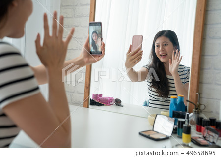 famous blogger making selfie after done make up famous blogger making selfie after done make up 49658695