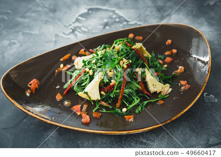 Vegetarian salad with mushrooms, pine nuts, pepper 49660417
