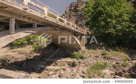 Bridge over Veneticos river  in Greece 49660684