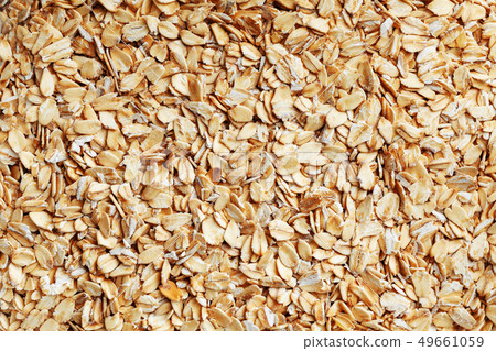 Golden cereal muesli, background and texture. Golden cereal muesli, background and texture. 49661059