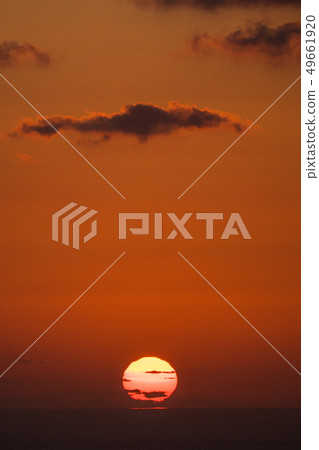 The sun, the sky and the ocean that sinks 49661920