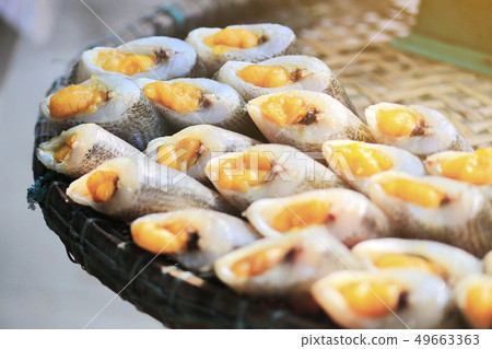 Dried fishs of Pla Salid in Thailand. 49663363