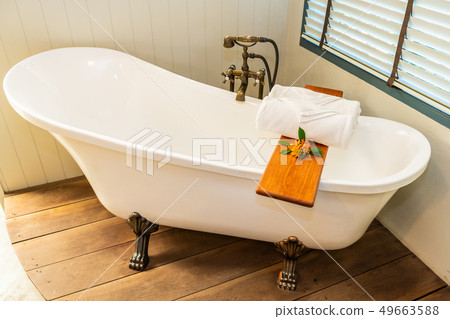 Beautiful luxury elegance white bathtub decoration interior of bathroom for spa relax Beautiful luxury elegance white bathtub decoration interior of bathroom for spa relax 49663588