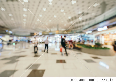 Abstract blur and defocused airport terminal interior Abstract blur and defocused airport terminal interior 49664418