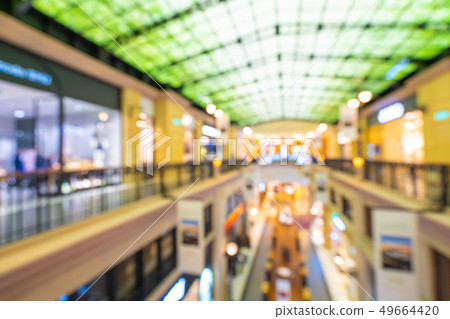 Abstract blur and defocused shopping mall of department store Abstract blur and defocused shopping mall of department store 49664420