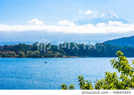 Beautiful landscape of mountain fuji with maple leaf tree around lake 49664460