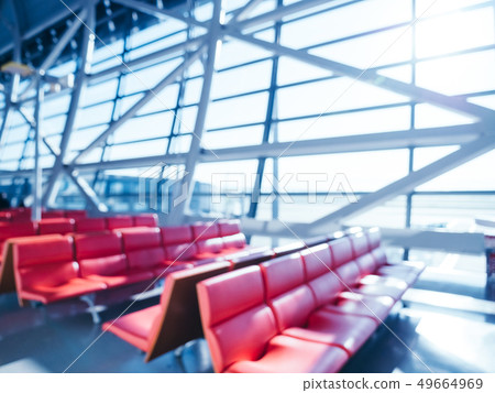 Abstract blur and defocused airport terminal interior Abstract blur and defocused airport terminal interior 49664969