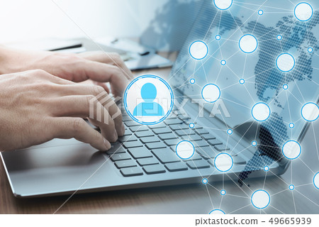 Image of internet communication. A man who uses a laptop computer. Image of internet communication. A man who uses a laptop computer. 49665939