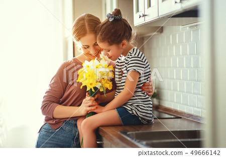 happy mother's day! child daughter   gives mother 49666142