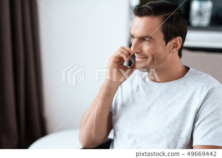 Portrait of Handsome Smiling Person Talking Phone Portrait of Handsome Smiling Person Talking Phone 49669442