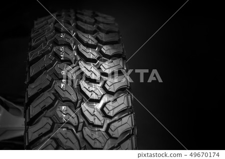 closeup new track off road tyre ATV mud tire closeup new track off road tyre ATV mud tire 49670174