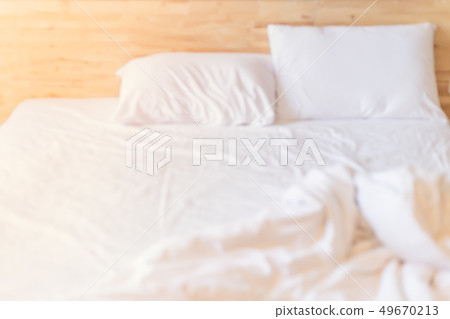 blur morning white clean messy bed for background blur morning white clean messy bed for background 49670213