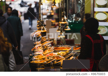 Eastern delicacies on sale at a street market  49670803