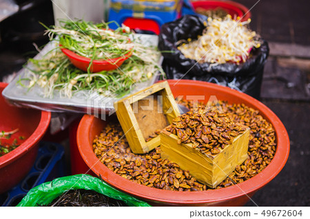 Eastern delicacies on sale at a street market Eastern delicacies on sale at a street market 49672604