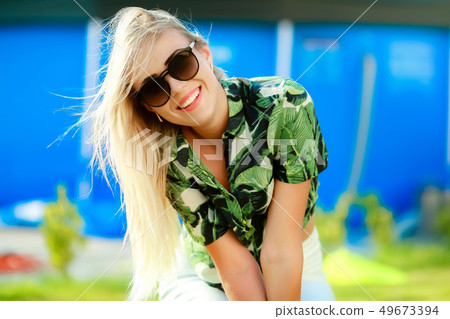 Attractive young woman, blonde with long hair and beautiful smile 49673394