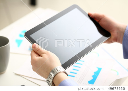 Businessman arm using modern pc pad closeup 49678630