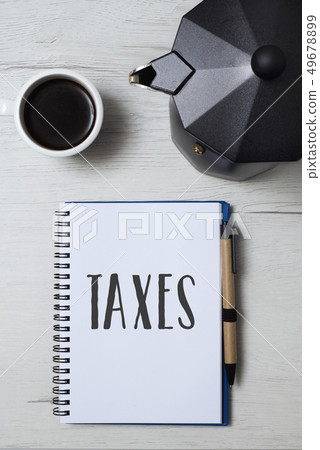 word taxes in a notebook. word taxes in a notebook. 49678899