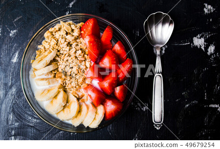 Breakfast cereals with banana and strawberry Breakfast cereals with banana and strawberry 49679254