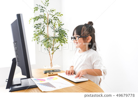 Child business woman doing desk work Child business woman doing desk work 49679778