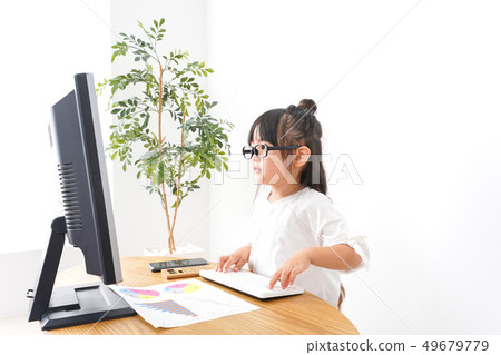 Child business woman doing desk work 49679779