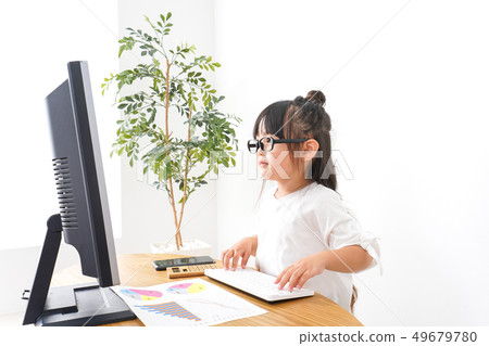 Child business woman doing desk work 49679780