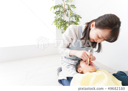 Child brushing teeth in kindergarten Child brushing teeth in kindergarten 49682180