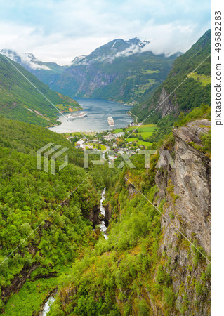Cruise ship in Geiranger seaport, Norway. 49682283