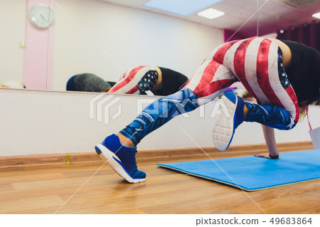 fitness, sport, training, gym and lifestyle concept - group of women working out in gym. 49683864