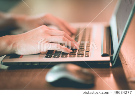 woman working with computer laptop and thinking to woman working with computer laptop and thinking to 49684277