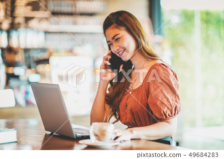 woman working with computer laptop and thinking to woman working with computer laptop and thinking to 49684283