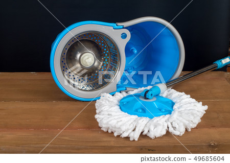 Floor cleaning with mob and bucket on background. 49685604