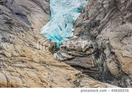 Briksdalsbreen glacier with melting blue ice 49686856