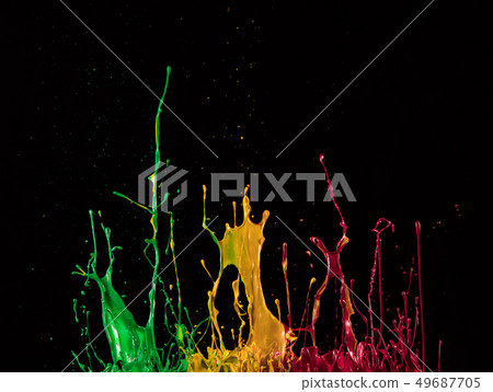 Macro photo of mixed acryl colors on black 49687705