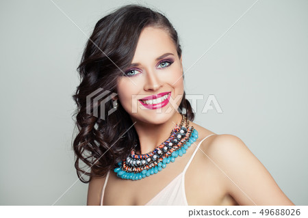 Cute model woman with makeup and perfect smile Cute model woman with makeup and perfect smile 49688026