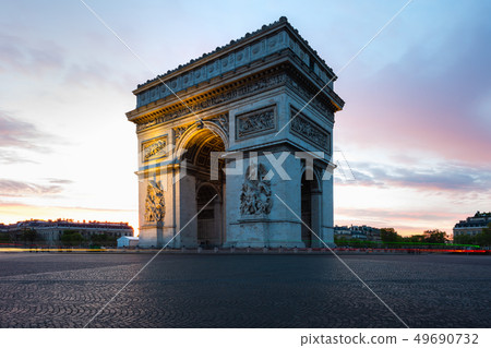 Paris street during sunrise with the Arc de 49690732