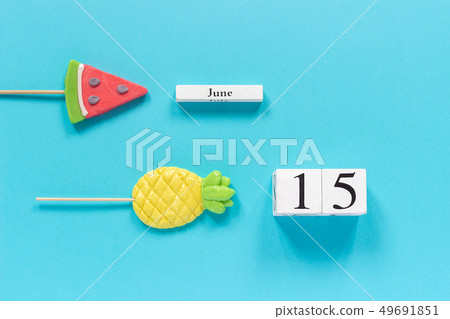 Wooden cubes calendar date June 15th and summer Wooden cubes calendar date June 15th and summer 49691851