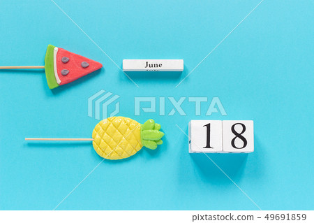 Wooden cubes calendar date June 18th and summer 49691859