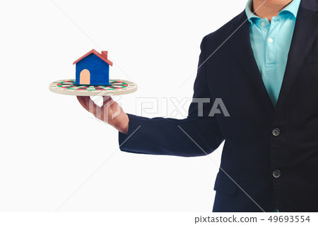 Business man with Home and land serve to customer. 49693554