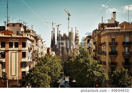 Sagrada Familia in street Sagrada Familia in street 49694658