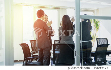 Business person applauding 49699374